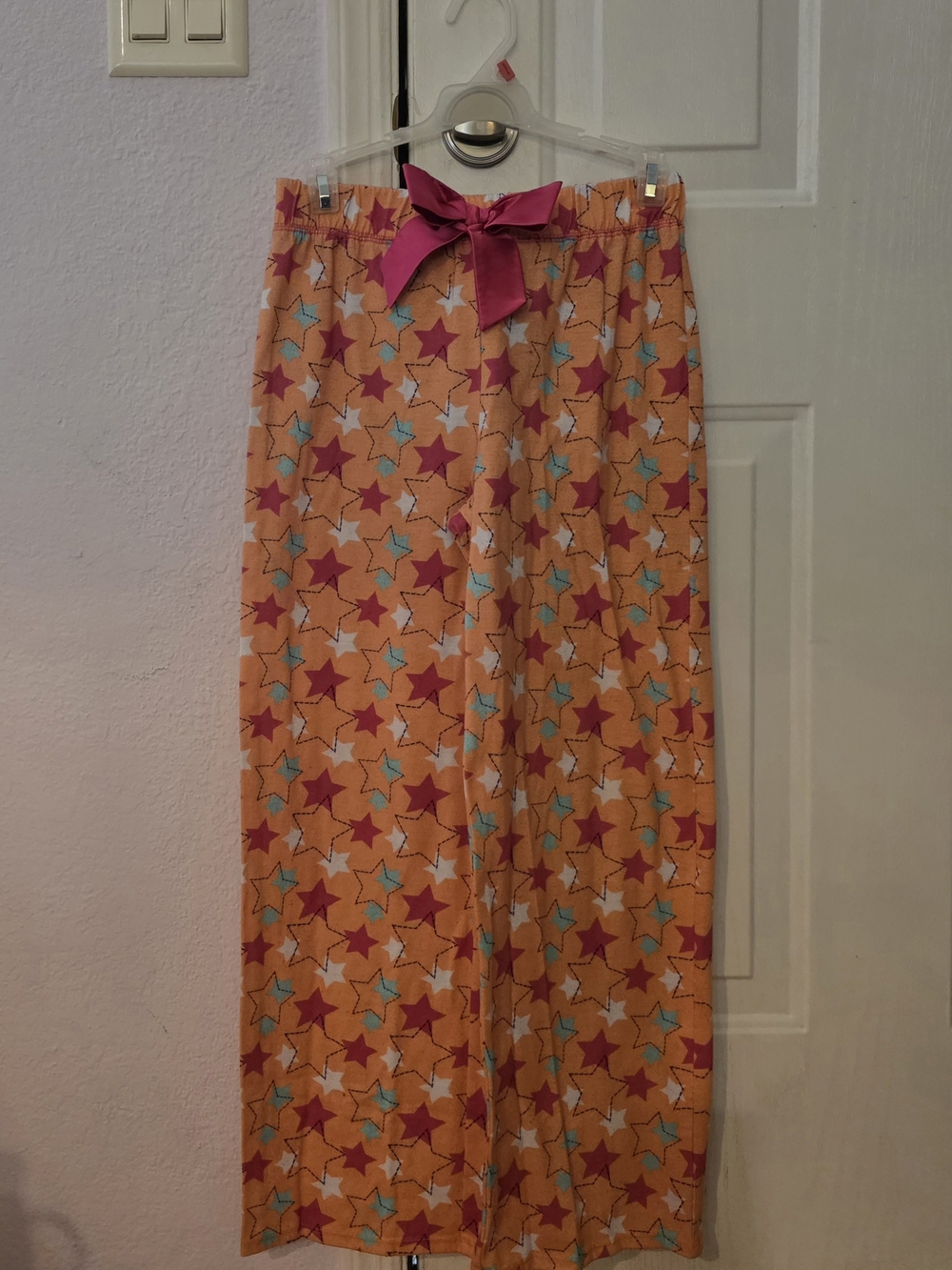 NWOT- Xhilaration Girls XL Orange Star-Print Lounge Pants  with Pink Bow